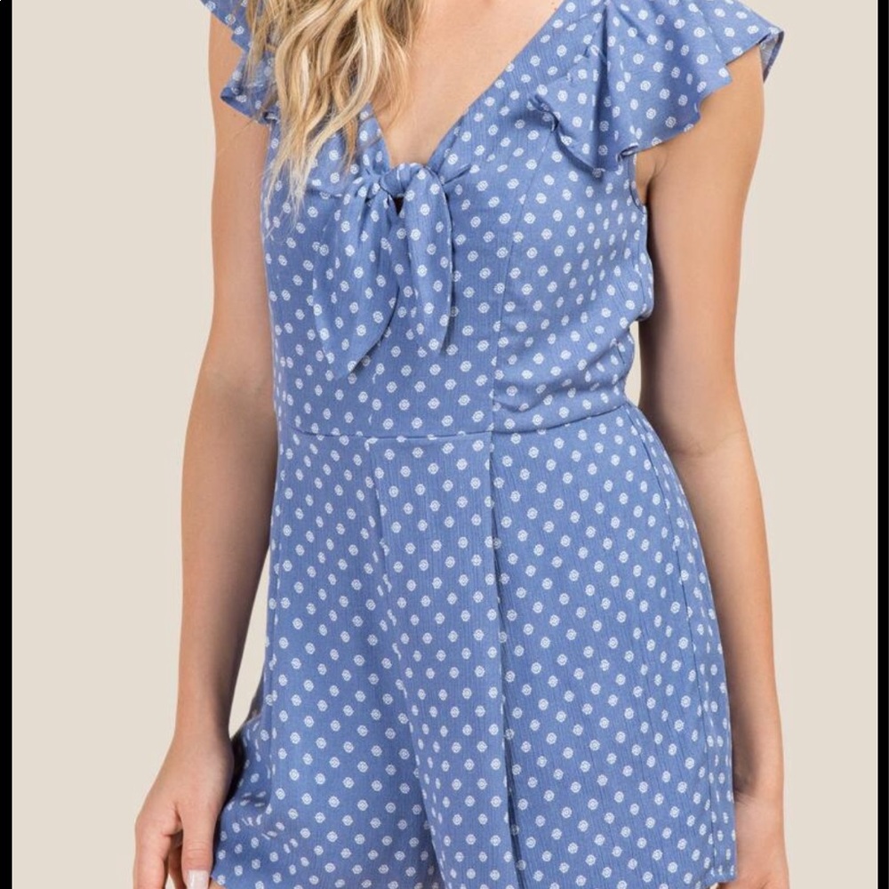 Francesca’s boutique blue polkadotted romper